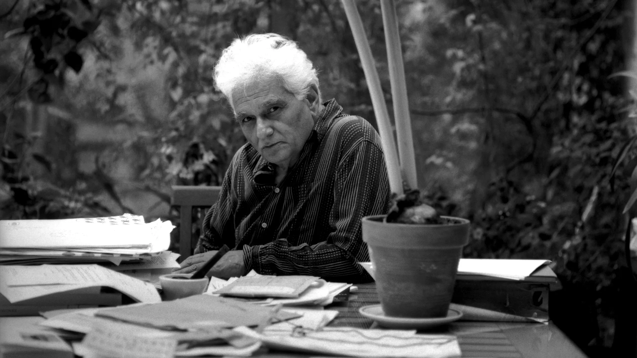 The image shows Derrida, the man who is the champion of 'Deconstruction'.