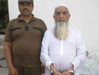 The image shows a cleric being arrested for sexual abuse