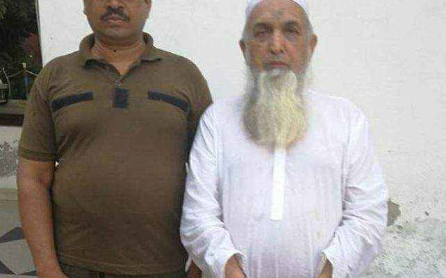 The image shows a cleric being arrested for sexual abuse