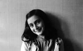 The image shows Anne smiling.