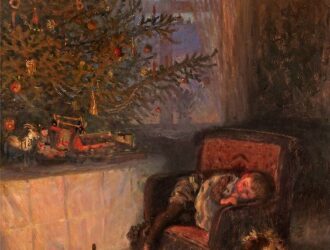 Child by the Christmas tree